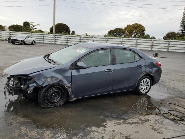 TOYOTA COROLLA L 2019 with VIN 5YFBURHE5KP938845 - Photo from auction