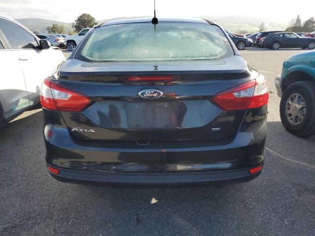 Foto 6 de la subasta – 2013 FORD FOCUS SE con VIN 1FADP3F20DL252090