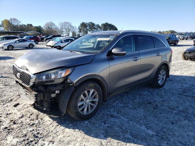 KIA SORENTO LX 2016 with VIN 5XYPG4A3XGG076789 - Photo from auction