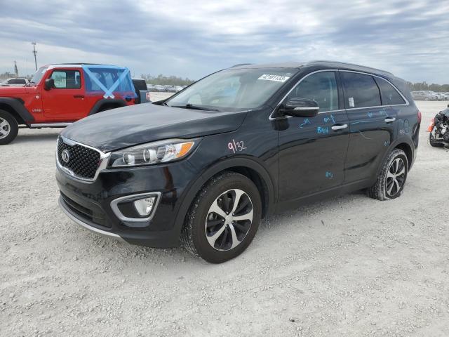 KIA SORENTO EX 2016 with VIN 5XYPH4A12GG010927 - Photo from auction