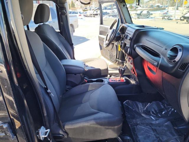 Photo 5 from auction – 2015 JEEP WRANGLER U with VIN 1C4BJWDG8FL764704