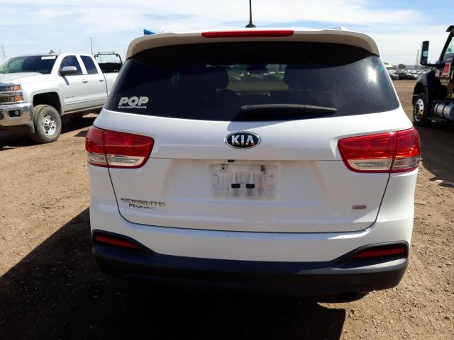 Photo 6 from auction – 2016 KIA SORENTO LX with VIN 5XYPG4A34GG083981