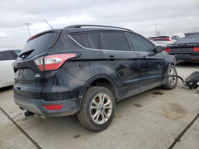 Photo 3 from auction – 2018 FORD ESCAPE SE with VIN 1FMCU0GD5JUB15578