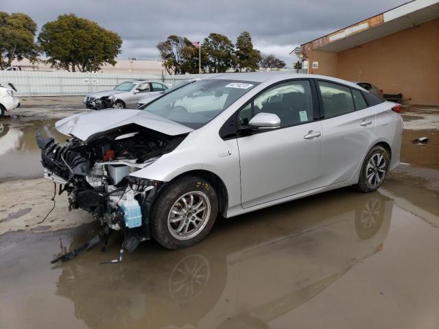 TOYOTA PRIUS PRIM 2018 with VIN JTDKARFP5J3082175 - Photo from auction