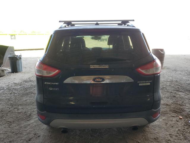 Foto 6 de la subasta – 2014 FORD ESCAPE TIT con VIN 1FMCU0J91EUB73648