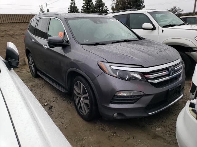 Photo 4 from auction – 2017 HONDA PILOT TOUR with VIN 5FNYF6H90HB033102