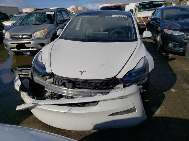 Photo 5 from auction – 2021 TESLA MODEL 3 with VIN 5YJ3E1EA3MF872041