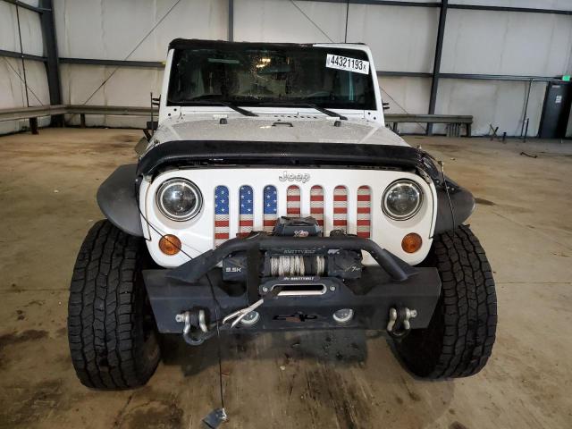 Photo 5 from auction – 2012 JEEP WRANGLER U with VIN 1C4BJWDG9CL272050