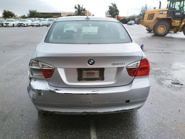 Photo 6 from auction – 2006 BMW 325 I with VIN WBAVB135X6KR60319