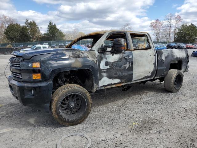CHEVROLET SILVERADO 2015 with VIN 1GC1KWE8XFF628184 - Photo from auction