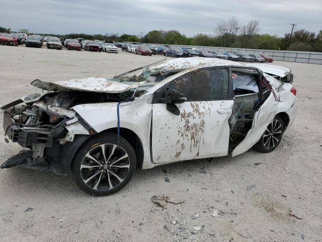 TOYOTA COROLLA L 2017 with VIN 5YFBURHE1HP575212 - Photo from auction
