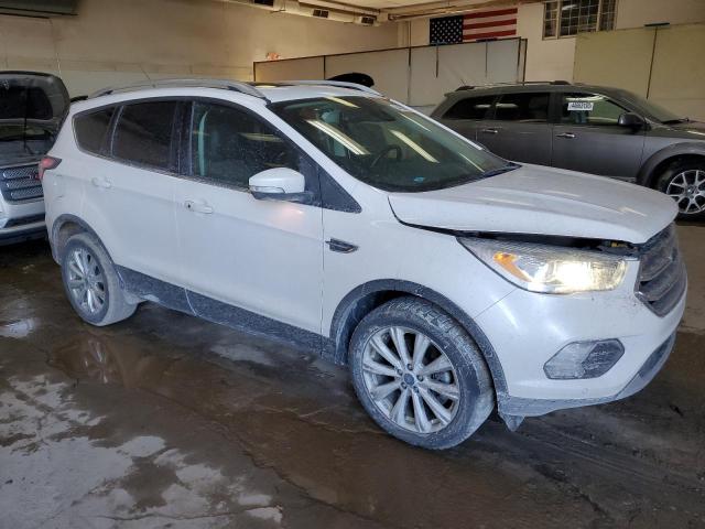 Photo 4 from auction – 2017 FORD ESCAPE TIT with VIN 1FMCU0J97HUA93033