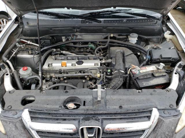 Photo 11 from auction – 2004 HONDA CR-V LX with VIN JHLRD68484C018176