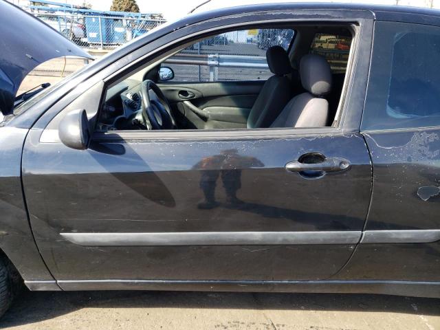 Photo 7 from auction – 2004 FORD FOCUS ZX3 with VIN 3FAFP31344R105121