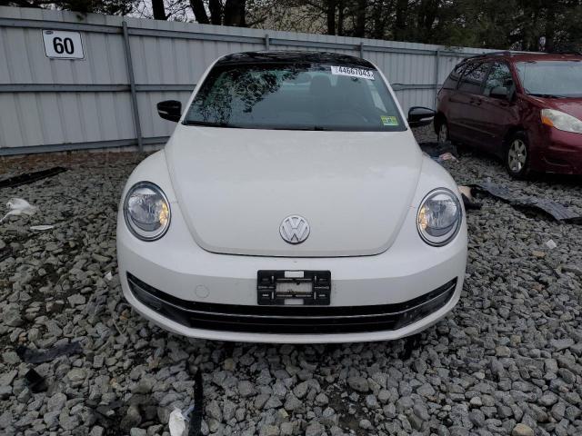 Photo 5 from auction – 2012 VOLKSWAGEN BEETLE TUR with VIN 3VWVA7AT4CM642336