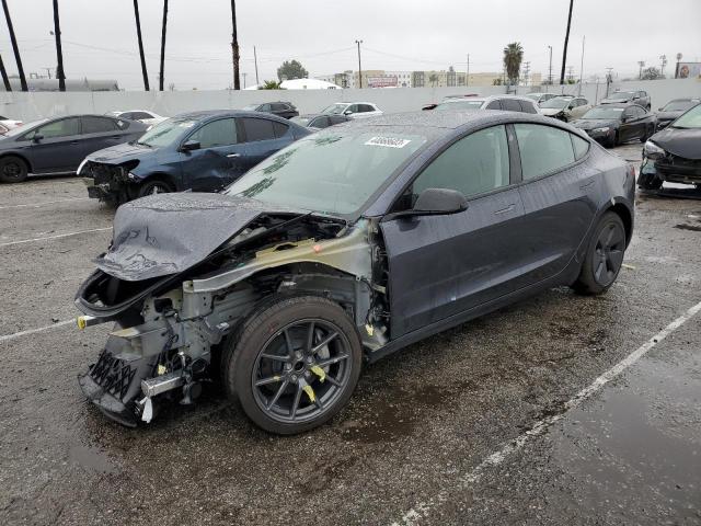 TESLA MODEL 3 2023 with VIN 5YJ3E1EAXPF418809 - Photo from auction