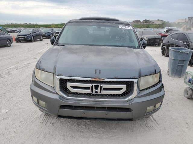 Photo 5 from auction – 2010 HONDA RIDGELINE with VIN 5FPYK1F51AB003814