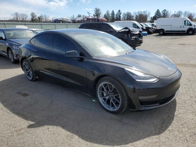 Photo 4 from auction – 2021 TESLA MODEL 3 with VIN 5YJ3E1EA4MF854406