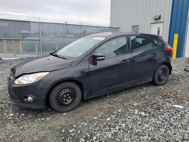FORD FOCUS SE 2014 with VIN 1FADP3K22EL289245 - Photo from auction