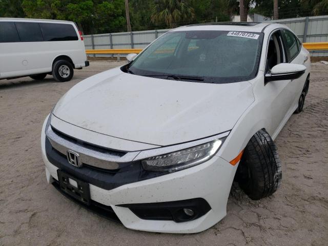 HONDA CIVIC TOUR 2016 with VIN 19XFC1F95GE045563 - Photo from auction