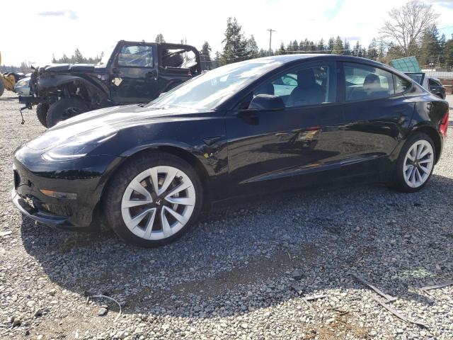 TESLA MODEL 3 2022 with VIN 5YJ3E1EA8NF369977 - Photo from auction