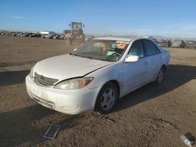 TOYOTA CAMRY LE 2002 with VIN 4T1BF30K92U019857 - Photo from auction