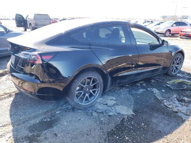 Photo 3 from auction – 2022 TESLA MODEL 3 with VIN 5YJ3E1EB8NF120488