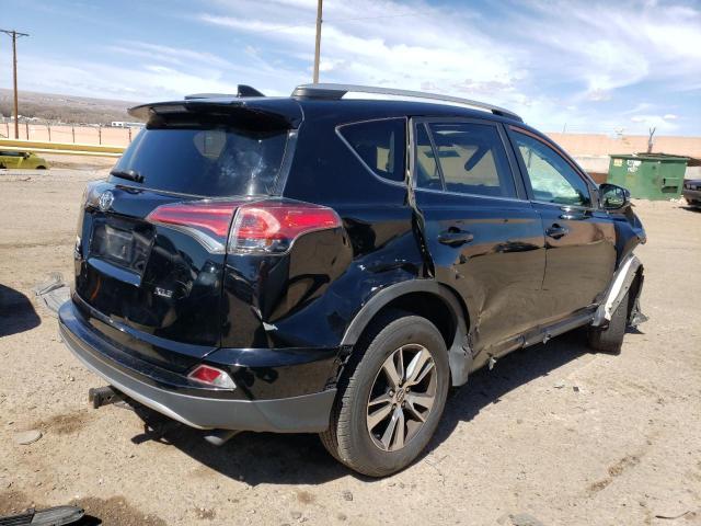 Photo 3 from auction – 2016 TOYOTA RAV4 XLE with VIN 2T3WFREV6GW253024