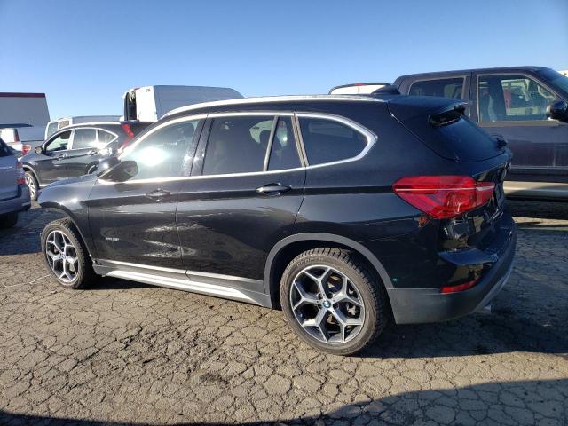 Photo 2 from auction – 2018 BMW X1 XDRIVE2 with VIN WBXHT3C38J5K24660