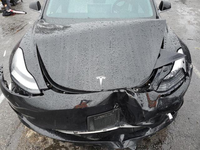 Photo 11 from auction – 2019 TESLA MODEL 3 with VIN 5YJ3E1EA2KF444765