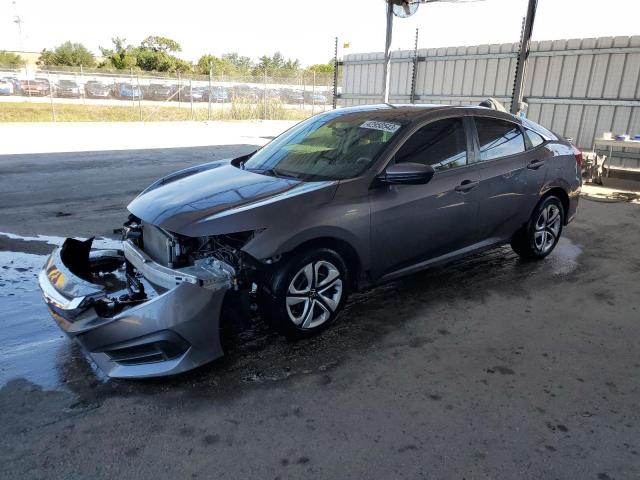 Photo 1 from auction – 2018 HONDA CIVIC LX with VIN 19XFC2F5XJE025156