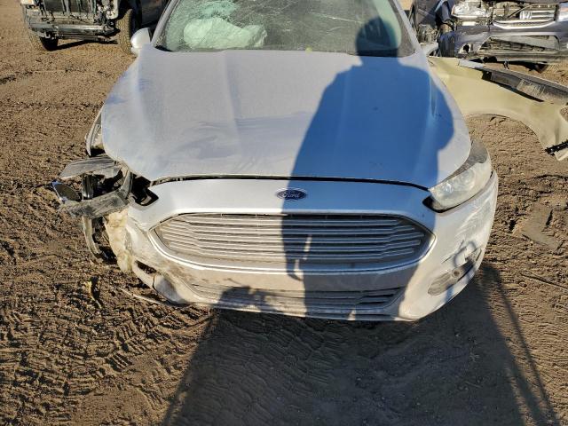 Photo 11 from auction – 2016 FORD FUSION TIT with VIN 3FA6P0K90GR160090