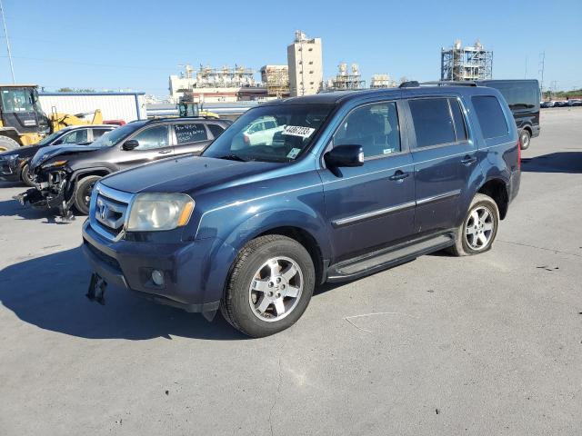 HONDA PILOT TOUR 2011 with VIN 5FNYF3H92BB043989 - Photo from auction