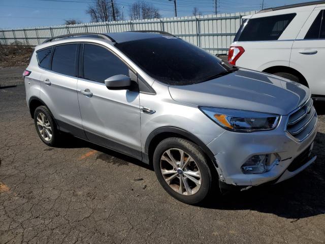 Photo 4 from auction – 2018 FORD ESCAPE SE with VIN 1FMCU0GD2JUC31675