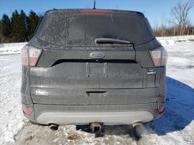 Photo 6 from auction – 2017 FORD ESCAPE SE with VIN 1FMCU9G97HUC17264