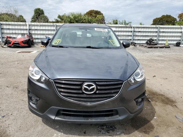Photo 5 from auction – 2016 MAZDA CX-5 with VIN JM3KE4CYXG0893864