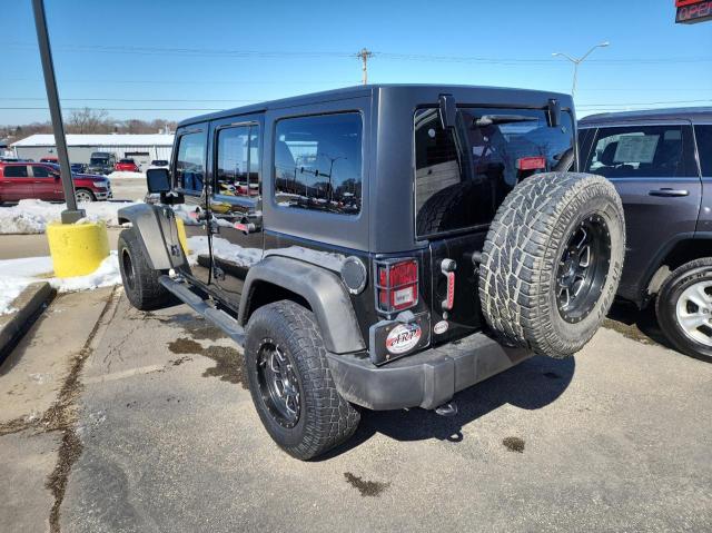 Photo 3 from auction – 2015 JEEP WRANGLER U with VIN 1C4BJWDG8FL764704