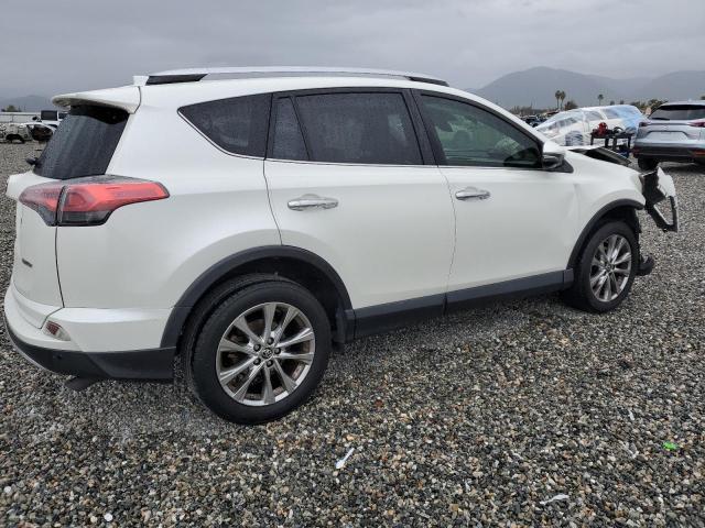 Photo 3 from auction – 2016 TOYOTA RAV4 LIMIT with VIN JTMYFREV3GD086031