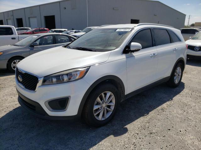 KIA SORENTO LX 2016 with VIN 5XYPG4A57GG109295 - Photo from auction