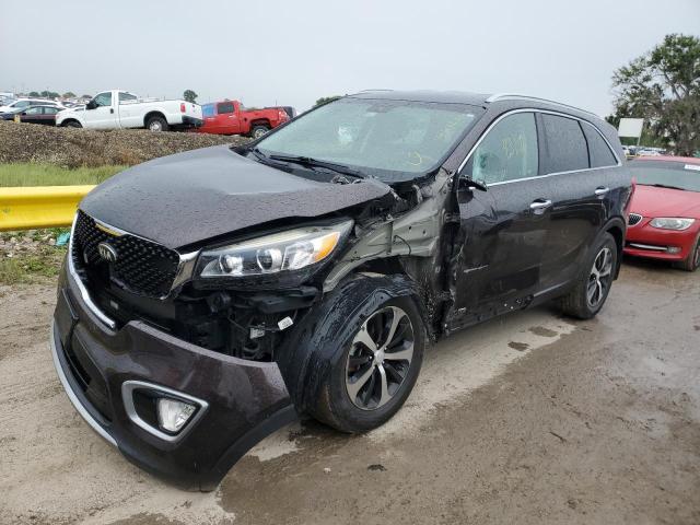 KIA SORENTO EX 2016 with VIN 5XYPHDA57GG176850 - Photo from auction