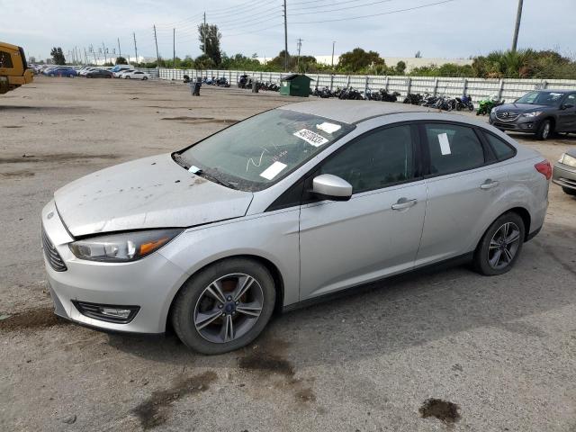 FORD FOCUS SE 2018 with VIN 1FADP3FE8JL203645 - Photo from auction