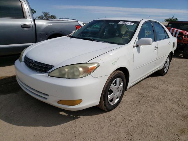 TOYOTA CAMRY LE 2002 with VIN 4T1BE32K42U082607 - Photo from auction