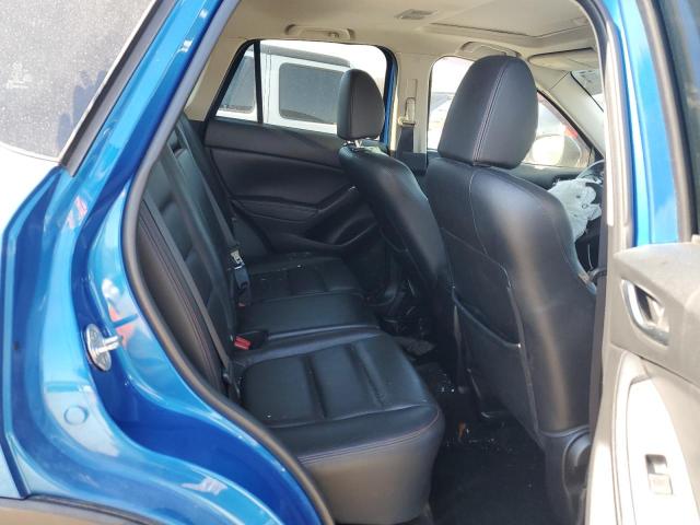 Photo 11 from auction – 2014 MAZDA CX-5 GT with VIN JM3KE2DY4E0303996
