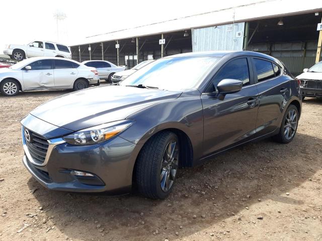 MAZDA 3 TOURING 2018 with VIN 3MZBN1L34JM261181 - Photo from auction