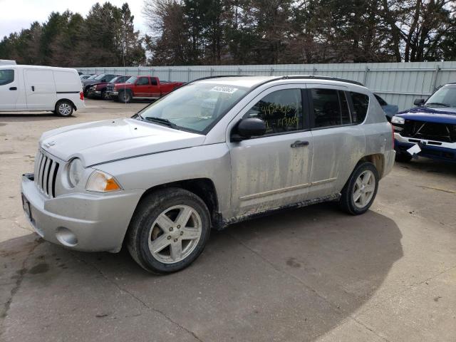 JEEP COMPASS SP 2010 with VIN 1J4NT1FA1AD624350 - Photo from auction