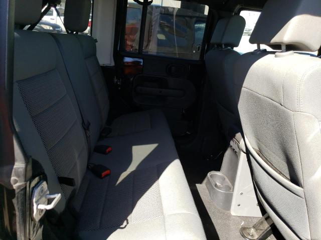 Photo 10 from auction – 2009 JEEP WRANGLER U with VIN 1J8GA69189L740247