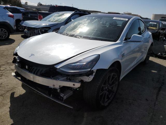 TESLA MODEL 3 2018 with VIN 5YJ3E1EA5JF009205 - Photo from auction