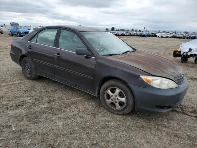 Photo 4 from auction – 2002 TOYOTA CAMRY LE with VIN JTDBE32K220003673
