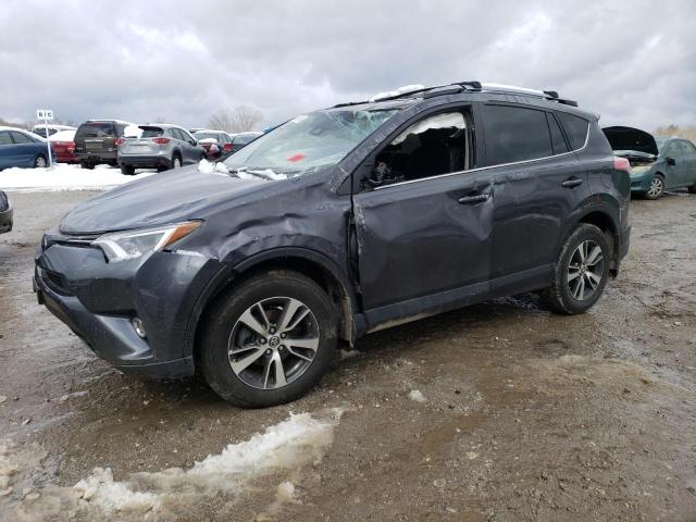 TOYOTA RAV4 XLE 2017 with VIN JTMRFREV0HJ174185 - Photo from auction