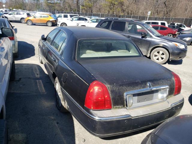 Photo 6 from auction – 2003 LINCOLN TOWN CAR E with VIN 1LNHM81W43Y700484